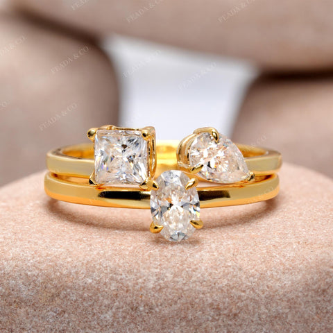 Yellow Gold Moissanite Three Stone Engagement Ring • Princess, Oval & Pear Cut